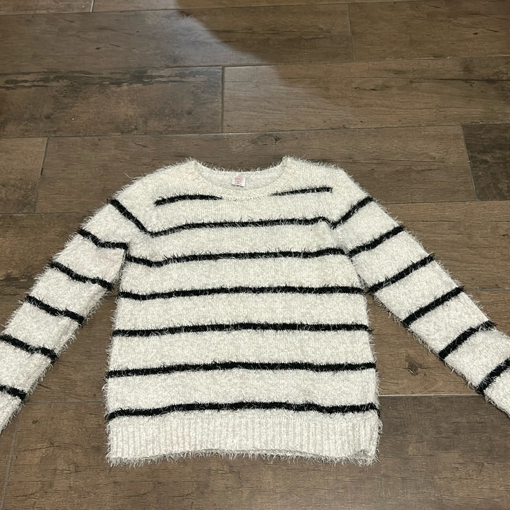 This a nice sweater ready to keep someone warm.